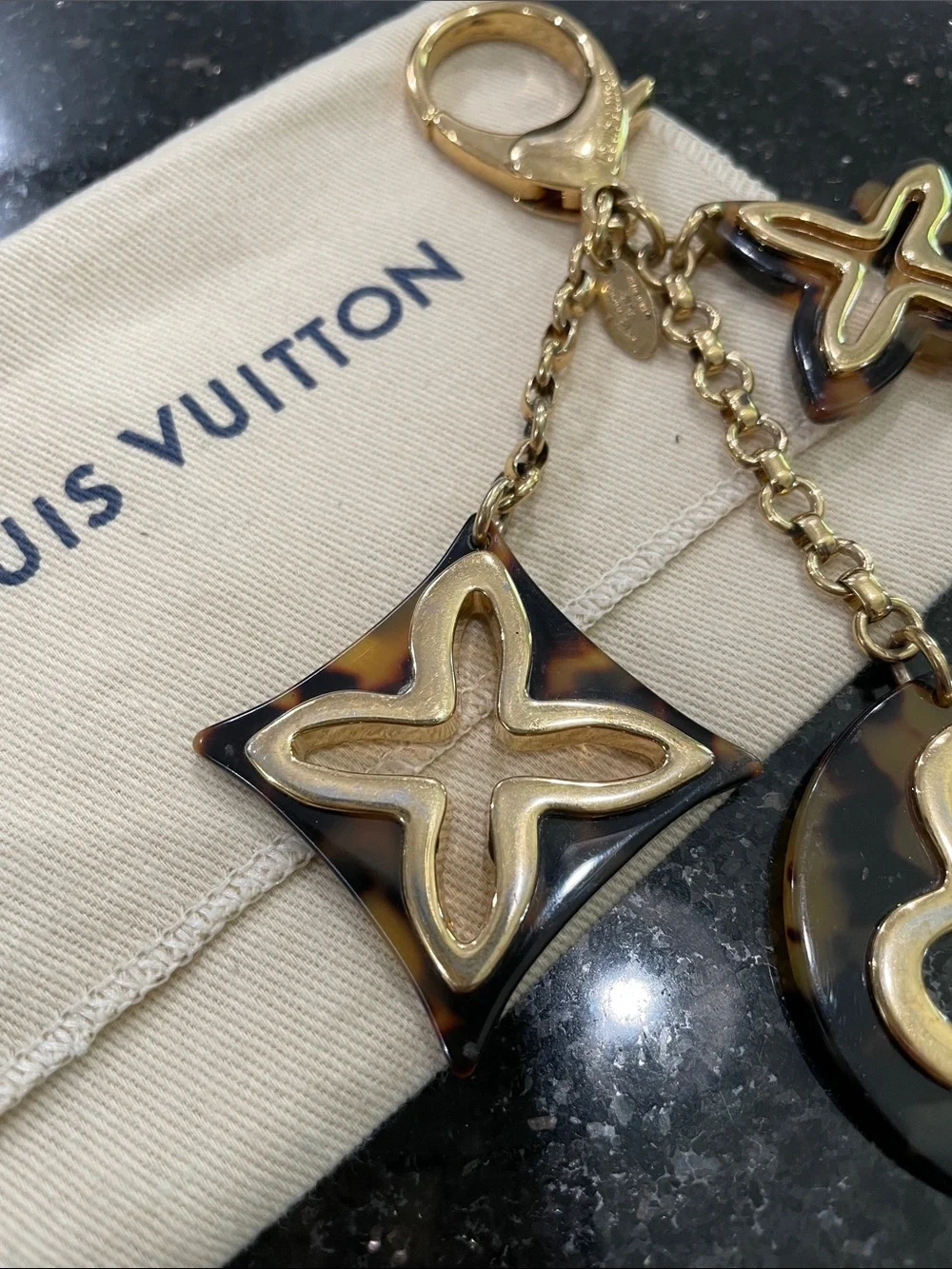 Louis Vuitton Insolence Bag Charm Metal and Tortoise Brown, Gold